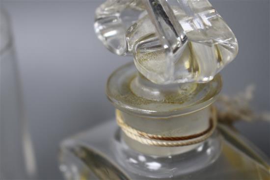 A Coty glass perfume bottle with frosted stopper, height 12cm, and a Guerlain Mitsouko perfume bottle, height 12cm